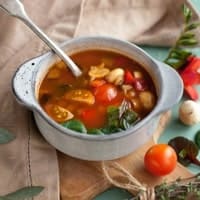 Hot soup bowl with soft bread slices